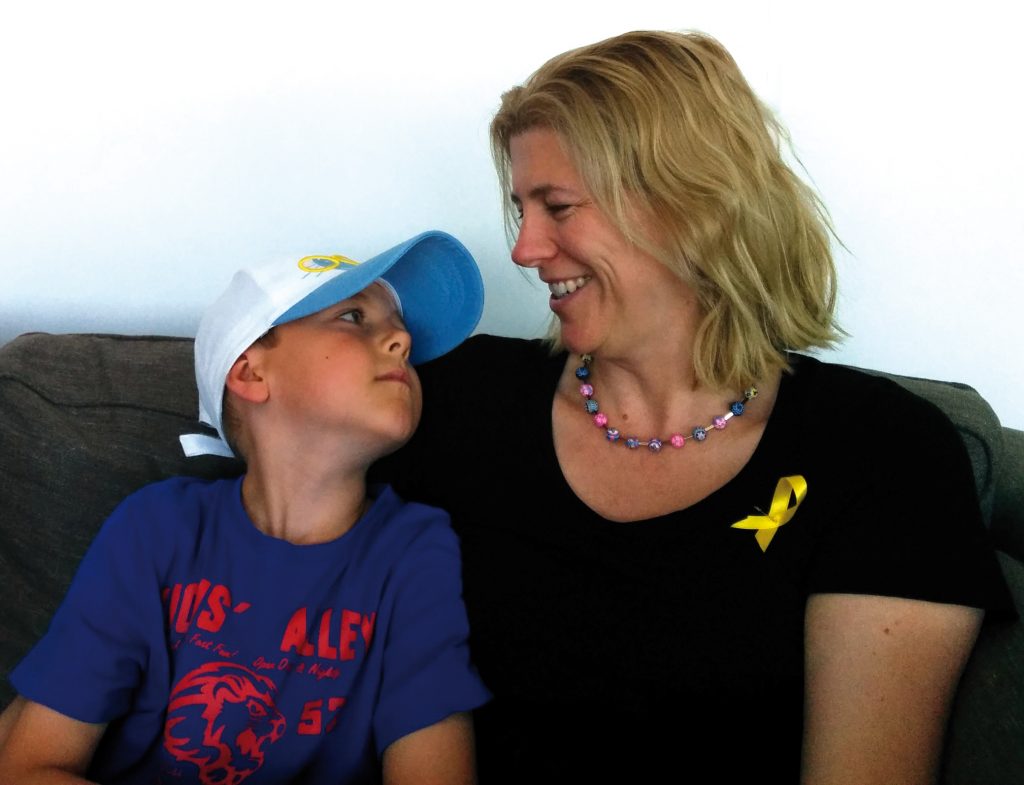 The lucky ones. Elliot Scobie, with his mother Nicole, who is campaigning for regulatory changes to incentivise the development of new drugs for paediatric cancers